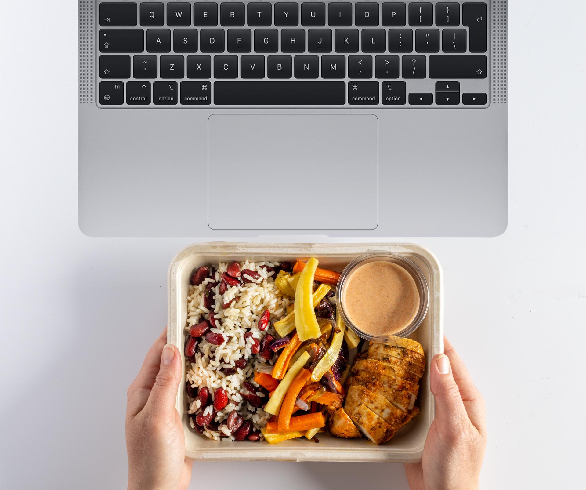 Cajun chicken meal being eaten at a desk